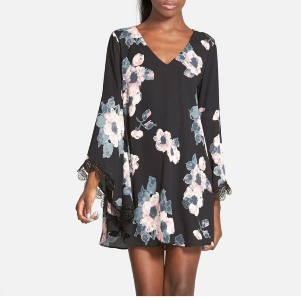 Astr the Label black floral dress with bell sleeves Size Small